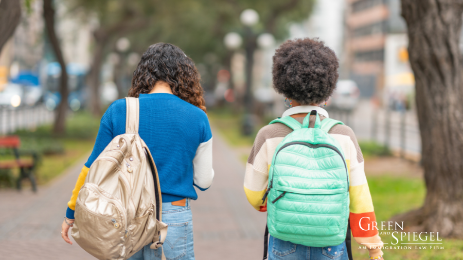 International students walking with backpacks 