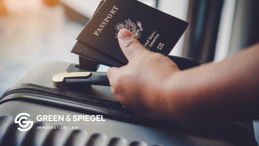 Person at an airport holding a passport, preparing to travel to Canada